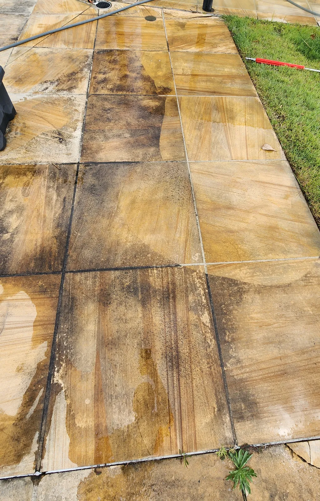 Half cleaned sandstone showing the clean line