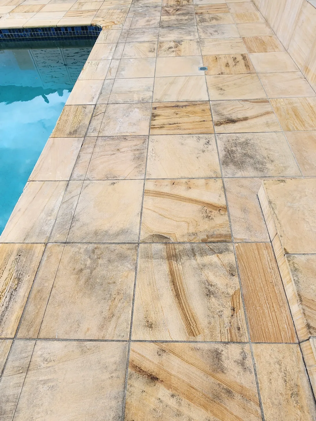 Mouldy sandstone pavers before ThermoBlast cleaning