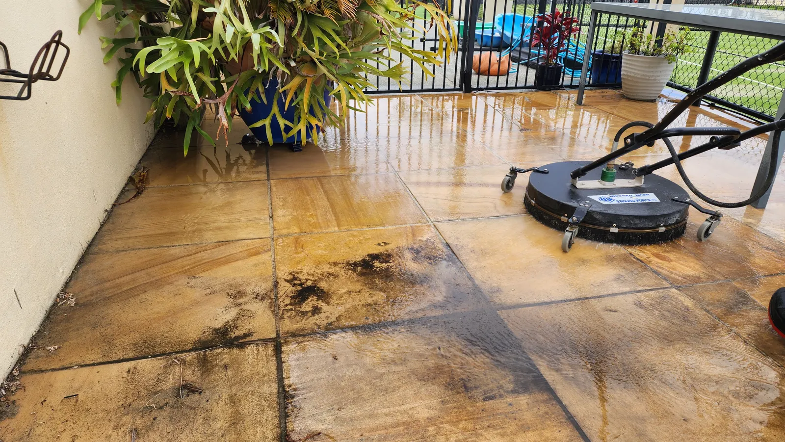 Surface cleaner removing mould from sandstone
