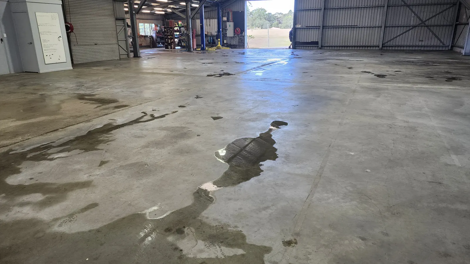 Warehouse floor after ThermoBlast cleaning, still wet